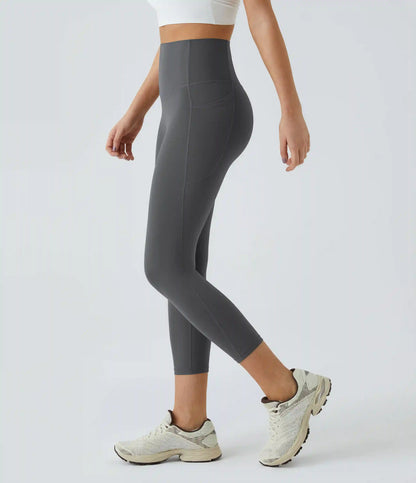 Halara UltraSculpt™ High Waisted Tummy Control Pocket Shaping Training Capri Leggings